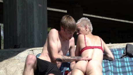 Skinny mature short haired granny outdoors