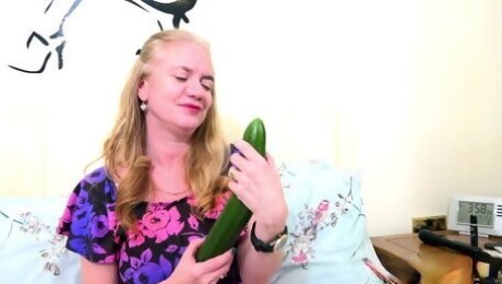 Sex-starved old woman Lily May tries to satisfy herself with a huge cucumber