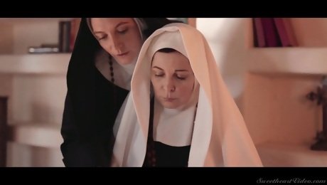 Two sinful mature nuns are licking and munching each others pussies