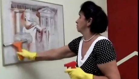 This granny cleaning lady ends up having a big young cock in her hungry pussy