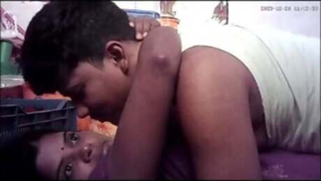 Indian wife kissing in husband