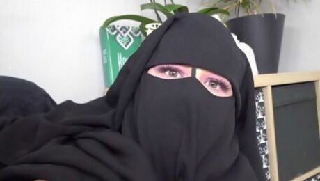 Video  Lusty brunette in a black hijab Little Elis screwed for money